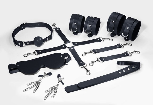 Набір Feral Feelings BDSM Kit 7, наручники, поножі, конектор, маска, паддл, кляп, затискачі SO8276 фото